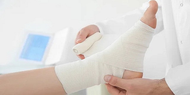 doctor-applying-bandage-onto-patients